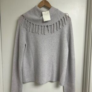 Cashmere sweater with tasseled cowl neck